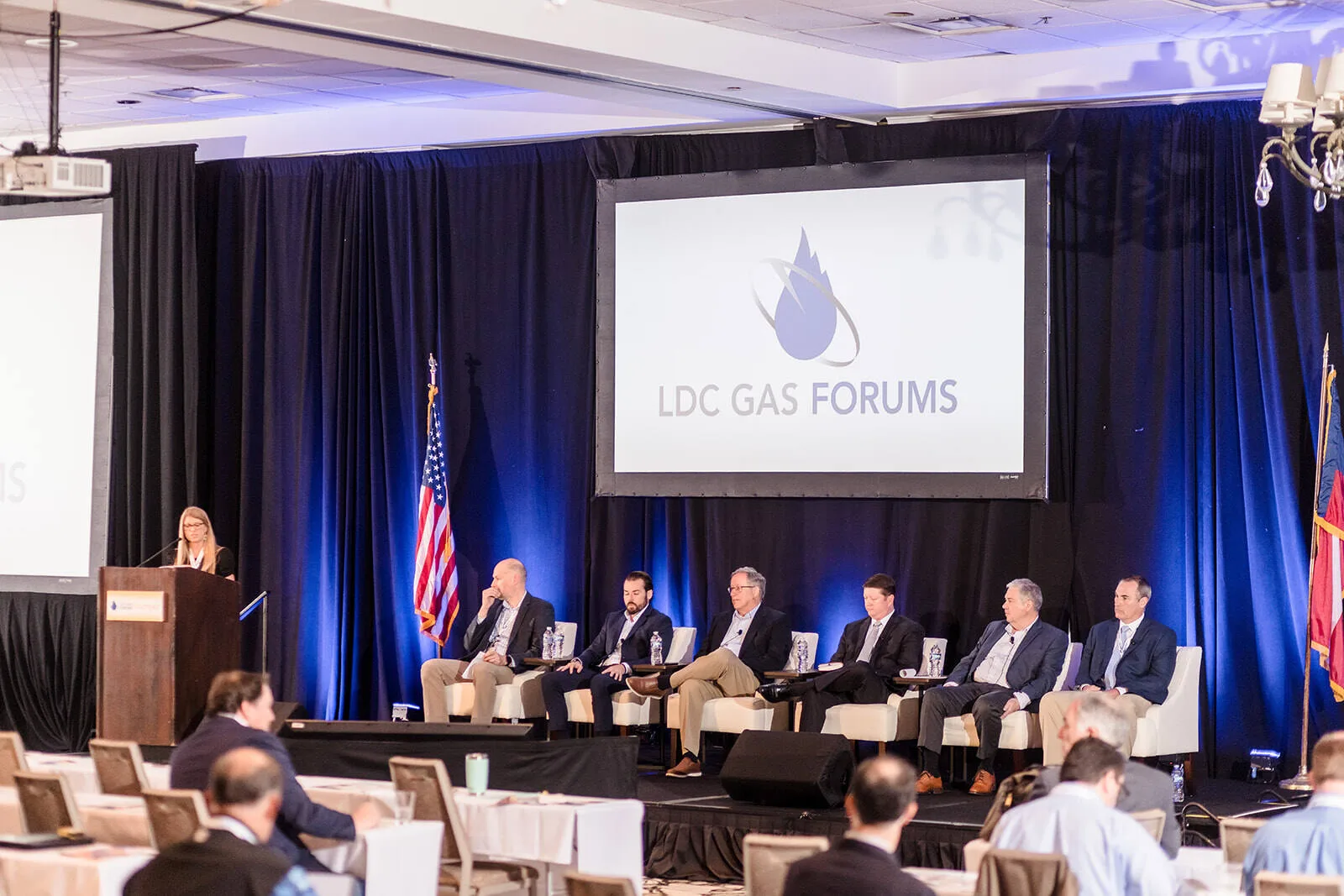 Corporate conference panel with audience